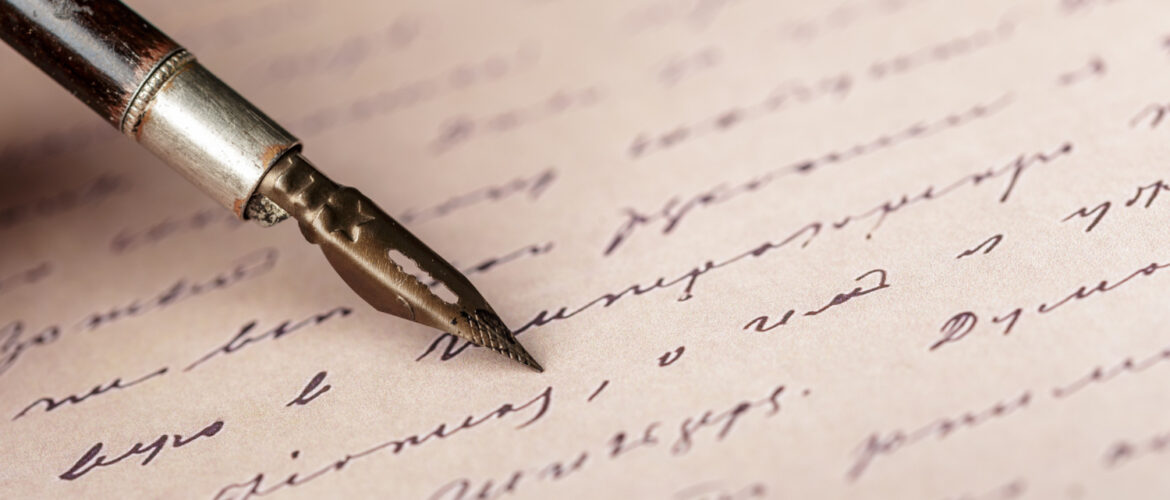 Ink pen on an antique handwritten letter
