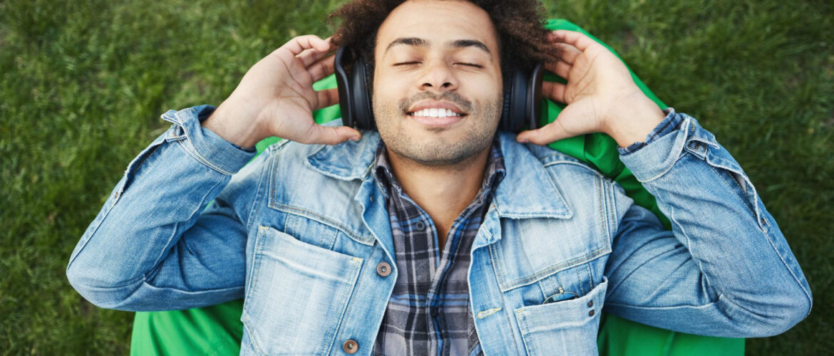 Young man enjoys the music in headphones